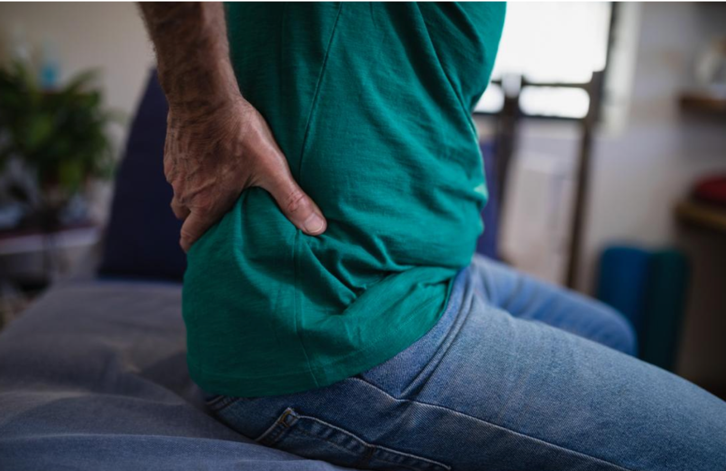 Figure 3: Clinical presentation of chronic low back pain and muscle guarding associated with degenerative disc disease.